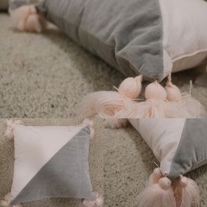 pink and gray tassel throw pillow